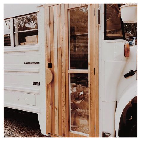 Bus Life on Instagram: “Front door is in! We reused the glass from the old bus doors and custom build our door to fit. ⠀⠀ #Skoolieconversion #tinyhome #conversion…” Skoolie Front Doors, Rv Front Door Ideas, Skoolie Door Ideas, Skoolie Front Door, Bus Door Conversion, Skoolie Dashboard, Skoolie Door, School Bus Conversion Exterior, Skoolie Design