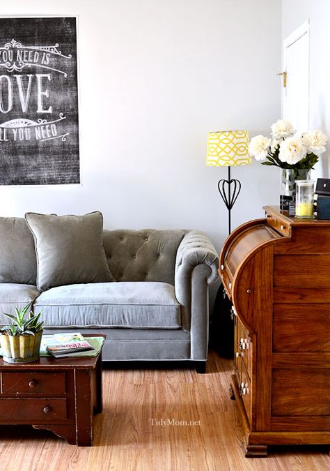 Grey tufted sofa