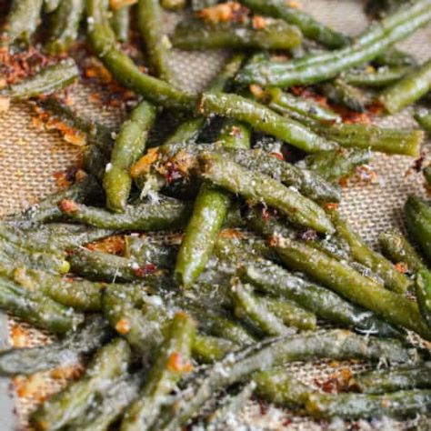 Cheesy Garlic Frozen Roasted Green Beans - Nourished by Nic Easy Frozen Green Bean Recipes, Roasted Frozen Green Beans, Frozen Green Bean Recipes, Freeze Beans, Crispy Green Beans, Green Beans Side Dish, Parmesan Green Beans, Garlic Green Beans, Freeze Greens