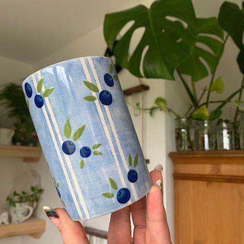 A little experimental blueberry themed pot ✨🫐🌱🎨 Available on my website now ✨💙 #art #artist #ceramics #pottery #painting #illustrator #ceramicstudio #potterytiktok #potterypainting #painter #vase #pot #blueberry Polka Dot Pottery Ideas, Blue Pottery Painting, Pottery Painting Ideas Vase, Vase Pottery Painting Ideas, Pottery Vase Painting Ideas, Pottery Painting Vase, Ceramic Vase Painting, Painting Blueberries, Blueberry Pottery