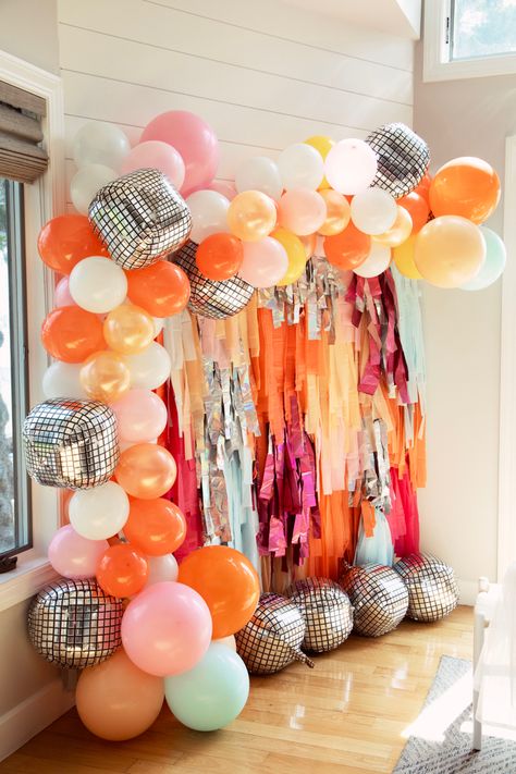 Custom balloon arch 70s 18th Birthday Party, Disco Arch Backdrop, Balloon Arch Disco Ball, Birthday Party Decorations Funky, Disco Party Color Scheme, Disco Balloon Wall, Dazed And Engaged Balloon Arch, Balloon Arch With Disco Balls, 60s Theme 60th Birthday