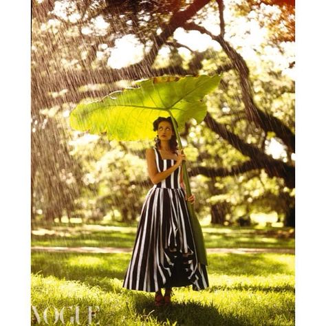 Model wears Kate Madden striped cotton dress. Photographed by Peggy Sirota for Vogue Australia, December 1992. #vintagevogue Peggy Sirota, Leaf Umbrella, Slim Aarons Poolside, Slim Aarons, Under My Umbrella, Vogue Covers, Vogue Australia, Vintage Vogue, The Grass