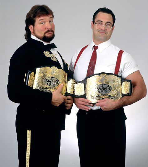 Money Inc. - "The Million Dollar Man" Ted DiBiase and I.R.S. (Mike Rotunda) professional wrestlers. Ted Dibiase, Wrestling Belts, Wwf Superstars, Jesse Ventura, Wwe Tag Teams, Watch Wrestling, Tna Impact, Professional Wrestlers, Wwe Tna