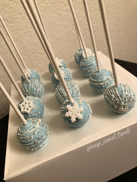 Frozen Cake Balls, Frozen Themed Sweet 16, Winter Themed Cake Pops, Frozen Themed Treats, Frozen Theme Cake Pops, Frozen Birthday Treats, Elsa Cake Pops, Winter Wonderland Cake Pops, Frozen Cakepops