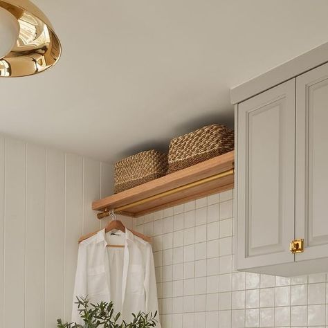 Tiffany Leigh Design on Instagram: "Laundry rooms are one of those spaces that are often overlooked in design, but require some extra thought to be functional and somewhere you want to be when doing those daily chores! 

Some of my top tips for laundry room design are:
- Include hanging rails, large sinks and as much counter space as possible. Including functional design elements like these will make those laundry days as seamless as possible. 
- Use durable materials. This space is going to be used and used, so including durable materials is going to ensure the space looks as good as it did when it was installed. 
- Think warm. Just because this room has a practical function doesn’t mean it has to be cold. Using materials such as wood and brass will make for an inviting space. Who knows - Wood Counter Laundry Room, Hanging Space In Laundry Room, Tiffany Leigh Design, Daily Chores, Wood Counter, Laundry Room Design, Counter Space, Laundry Rooms, Hanging Rail