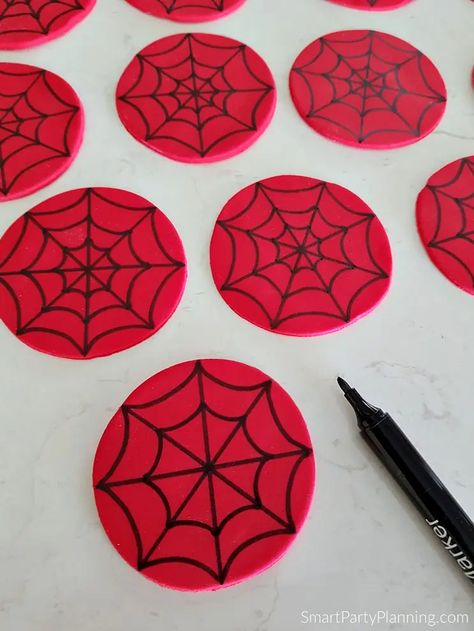 Completed web on fondant spiderman cupcake toppers Fondant Spiderman, Spider Man Cupcakes, Spiderman Cupcake Toppers, Man Cupcakes, Spiderman Cakes, Easy Cupcakes Decoration, Web Face, Spider Man Birthday Party, Spidey Birthday