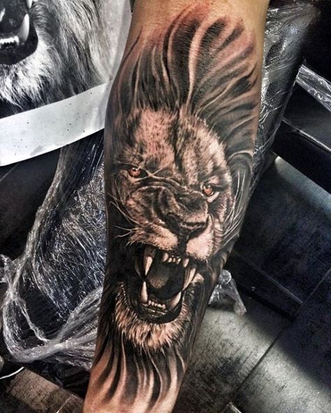 40 Lion Forearm Tattoos For Men - Manly Ink Ideas Forearm Animal Tattoo, Roaring Lion Tattoo, Animal Tattoo Designs, Lion Tattoo Meaning, Lion Forearm Tattoos, Animal Tattoos For Men, Tier Tattoo, Lion Tattoo Sleeves, Mens Lion Tattoo