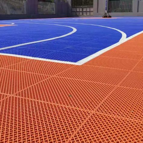 High quality non-slip suspended outdoor interlocking plastic basketball playground floor tiles. Give your community or team a court that lets kids run free and athletes play hard. For decades, we’ve been building a place to play for teams and communities across the globe. Our easy maintenance, safety features, and customizable designs surpass the expectations of coaches, athletes, builders, architects, and facility owners. Basketball Playground, Outdoor Sports Court, Rubber Playground, Sport Mat, Playground Flooring, Rubber Products, Play Garden, Rubber Tiles, Garden Floor