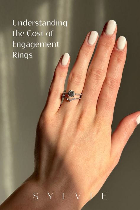 Thinking about purchasing an engagement ring? It's not just a romantic gesture—it's also a big financial decision. Whether after a traditional and timeless piece, a unique modern design, or a classy vintage vibe, we’ve got you covered. From the diamond quality and carat weight to the metal and design, here’s everything you need to know before buying your future bride's dream ring. Understanding The Cost Of Engagement Rings | Engagement Ring Shopping | Sylvie Jewelry Traditional Engagement Rings Vintage, Non Traditional Engagement Rings Vintage, Non Traditional Engagement Rings, Sylvie Engagement Rings, Engagement Ring Shopping, Traditional Engagement Rings, Classy Vintage, Romantic Gestures, Future Bride