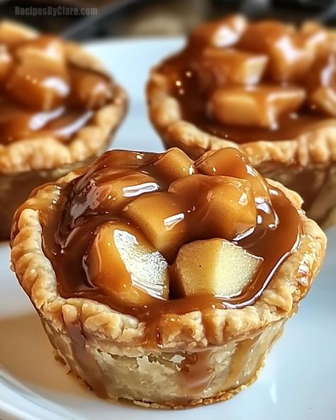 These Mini Caramel Apple Pies are the perfect sweet and easy fall dessert—small, scrumptious, and full of flavor! Cupcake Pies Mini, Mini Salted Caramel Apple Pies, Mini Pie Filling Ideas, Mini Apple Pie Cups, Apple Pie Individual, Mini Muffin Pies, Banana Cream Pie Bites, Apple Pie Mini Pies, Apple Mini Tarts