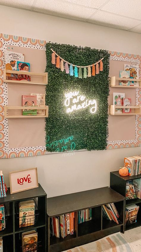 Reading Library Classroom Ideas, Ipad Station Classroom, Diy Home Classroom Ideas, Fake Grass Wall Decor Classroom, Classroom Student Station, Peg Board Classroom Ideas, Middle School English Classroom Setup, Led Classroom Decor, Neon Classroom Door Ideas