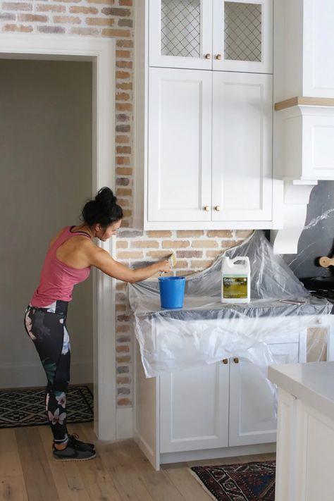 Brick Backsplash Gray Countertop, Real Brick Backsplash Kitchen, Distressed Brick Backsplash, Gray Kitchen Cabinets With Brick Backsplash, How To Grout Brick Backsplash, Chicago Brick Backsplash Kitchen, Brown Brick Backsplash Kitchen, Grouting Brick Backsplash, Limewash Brick Backsplash