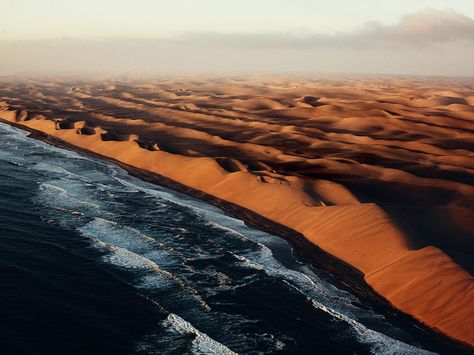 See the towering dunes of Namibia's Namib Desert run into the Atlantic Ocean in this National Geographic Photo of the Day. Namibia Desert, Namibia Travel, Namib Desert, Landscape Photography Tips, Aerial Photo, National Geographic Photos, Sand Dunes, Atlantic Ocean, The Atlantic