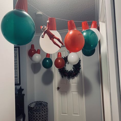 Balloons Elf On The Shelf, Elf On The Shelf In Balloon Ideas, Elf On The Shelf With Balloons, Elf Balloon Ideas, Elf On The Shelf Balloons, Elf On The Shelf Balloon, Welcome Back Elf, Hallway Decorations, Elf Stuff