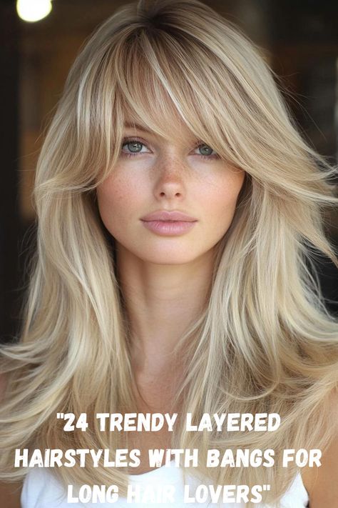 Embrace the latest trends with these 24 layered hairstyles featuring bangs designed specifically for long hair. From sleek and polished finishes to messy, beachy vibes, each style offers versatility and elegance. Explore how layers and bangs can frame your face, enhance your features, and add movement to your luscious locks. Layered Haircuts With Long Bangs, Loose Curls With Curtain Bangs, Feather Bangs Long Hair, Long Bang Haircut, Long Bangs Side Part, Blowout Hair With Bangs, Blonde Long Hair With Bangs, Face Framing Layers With Curtain Bangs, Long Hair Bangs Hairstyles