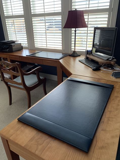 This item is our Black Bonded Leather Desk Pad. These hand built desk pads will go with almost any office color scheme, and they have 3'' wide side rails, so you can insert one of our calendars or blotter paper. You can find this lovely item here: https://www.theelegantoffice.com/ Leather Desk Top New, Diy Leather Desk Pad, Large Desk Pad, Office Color Scheme, Desk Leather Pad, Leather Desk Accessories, Desk Pads, Leather Desk Pad, Office Color