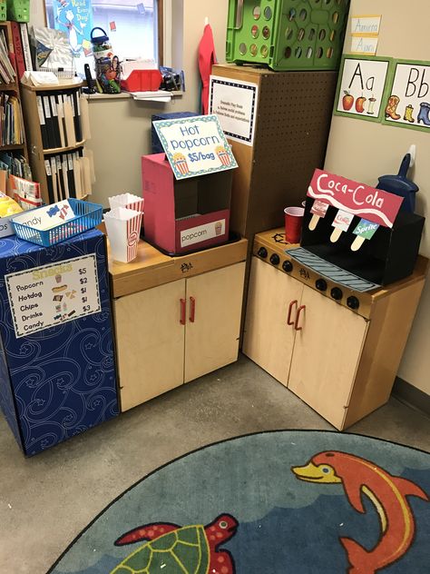 Dramatic play area concession stand Community Dramatic Play, Mcdonalds Dramatic Play Center Ideas, Dramatic Play Tool Shop, Theater Dramatic Play Preschool, Mcdonalds Pretend Play, Diy Drink Machine Dramatic Play, Dramatic Play Movie Theater, Mcdonald’s Dramatic Play, Food Dramatic Play