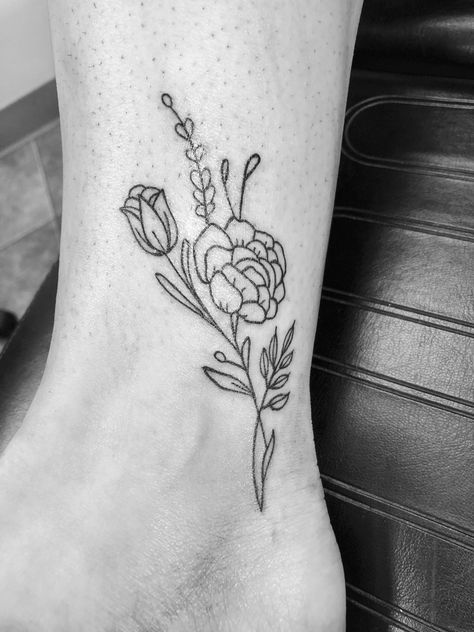 Tulip and peony floral ankle tattoo Carnation And Tulip Tattoo, Ankle Tulip Tattoo, Tulip And Peony Tattoo, Tulips And Roses Tattoo, Peony Tulip Tattoo, Peony Tattoo Ankle, Tulip Name Tattoo, Tulip And Rose Tattoo, Peony Minimalist Tattoo