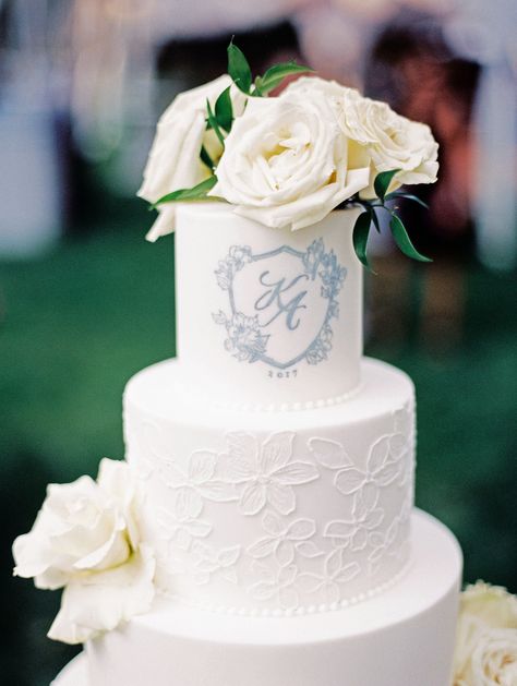 This couple's first initials were applied in a soft blue to this traditional, slightly-floral cake by Three Tarts Bakery. Wedding Cake Frosting, Vintage Pasta, Cakes Elegant, Monogram Wedding Cake, Floral Cake Topper, Wedding Cakes Elegant, Monogram Cake, Classic Wedding Cake, Wedding Cakes Blue