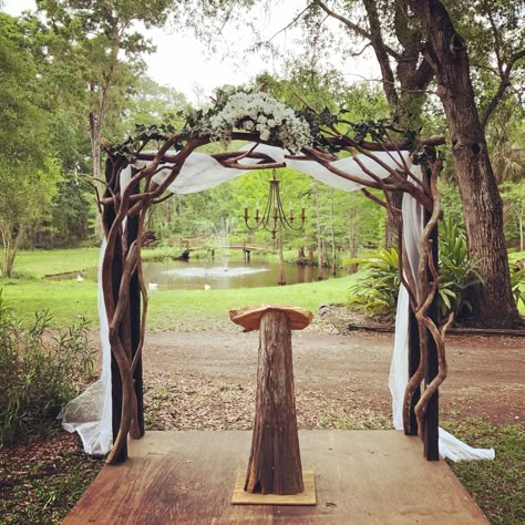 There are so many ways to decorate Cypress Creek’s rustic ceremony arch! Twig Wedding Arch, Stone Arch Wedding, Celtic Wedding Arch, Lotr Wedding Arch, Tree Arch Wedding Ceremony, Wedding Arch With Branches, Natural Wood Wedding Arch, Pagan Wedding Arch, Woodsy Wedding Arch