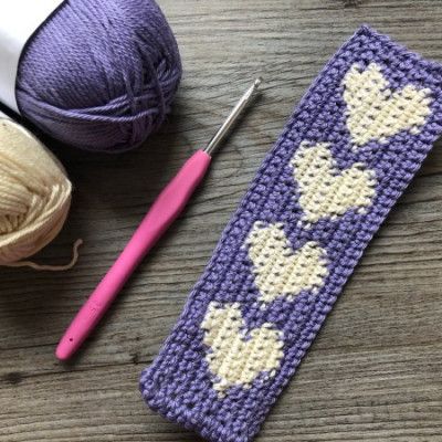 Little Hearts Bookmark | Free Crochet Pattern Bookmark Crochet Pattern Free, Crochet Heart Bookmarks Free Patterns, Crochet Heart Bookmark, Crochet Heart Bookmark Pattern, Star Crochet Bookmark, Bookmark Crochet Tutorial, Crochet Lavender Bookmark Pattern, Crocheted Bookworm Bookmark, Bookmark Crochet