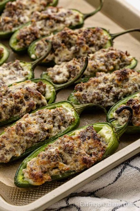 Sausage Stuffed Jalapeños Recipe Sausage Stuffed Jalapeno Peppers, Stuffed Jalapenos Cream Cheese, Jalapeno Poppers With Sausage, Crowd Pleaser Appetizers, Sausage Stuffed Jalapenos, Cream Cheese Stuffed Jalapenos, Stuffed Jalapeños, Sausage Cream Cheese, Jalapeno Popper Recipes