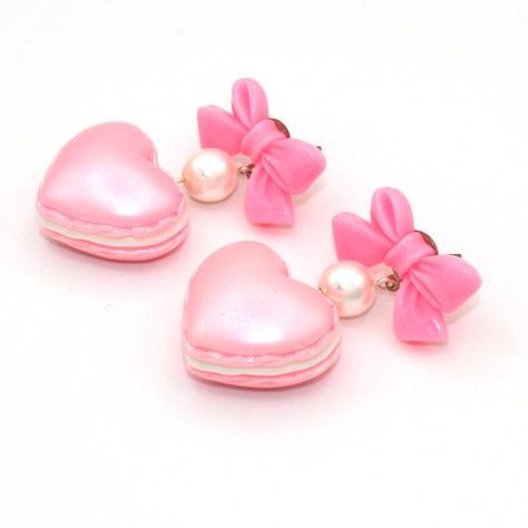 These adorable earrings are perfect for Valentine's Day or anytime of the year! Pastel pearl finish heart shaped macaron charms filled with whipped cream hung below pink bow posts with glass pearls. Posts are hypoallergenic surgical steel. Choose pink, purple or mint green. Charms are about 1" wide. Total earring length: about 2". Matching necklaces and rings in my shop>> https://etsy.com/shop/fatallyfeminine**Made to order - please allow 2 weeks for your item to be made before shipment**E Valentine’s Day Jewelry, Pink Accessories Aesthetic, Valentines Day Accessories, Candy Accessories, Valentines Day Earrings, Pink Gift Ideas, Jewelry Kawaii, Pastel Jewelry, Candy Earrings