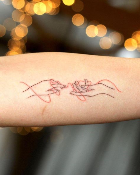 One Single Thread Of Gold Tied Me To You Tattoo, Hands Of Fate Tattoo, Reaching Hands Tattoo, Redline Tattoo, Thread Of Fate Tattoo, Red Thread Tattoo Ideas, Hopeful Tattoos, Thread Tattoo, String Of Fate Tattoo