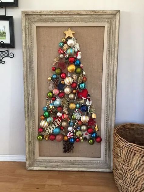 a Christmas tree wall art of bright vintage Christmas ornaments is a super cool and bold idea to repeat Christmas Tree In A Frame, Craft With Picture Frames, Ornament Frame Diy, Christmas Tree Crafts For Adults, Old Time Christmas Decorations, Christmas Tree Frame, Christmas Frames Diy, Christmas Ornament Frame, Christmas Crafty