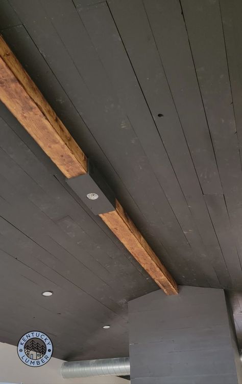 Shiplap ceiling painted charcoal black in a pole barn style new home build. Black Ceiling With Wood Beams, Black Shiplap Ceiling, Black Wood Ceiling, Black Beadboard, Ceiling Inspiration, Ceiling Painted, New Home Build, Shiplap Boards, Shiplap Wood