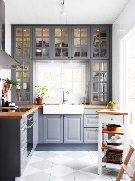 Gray cabinets with butcher block countertops Staggered Upper Kitchen Cabinets, Kitchens With Butcher Block Countertops, Popular Kitchen Countertops, Dapur Ikea, Butcher Block Countertops Kitchen, Ikea Bodbyn, Серая Кухня, Kabinet Dapur, Decor Ikea