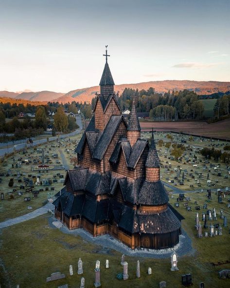 Just like plucked from a fairytale! ⛪⚔ The Heddal stave church (Heddal stavkirke) can be found in Norway and is the largest of all the preserved wooden churches. Who's also a fan of medieval architecture? 😨 📸 by @thomaswaerness⠀ ------------------------- #norway2day #worldheritage #antico #ancient #norway_photos #antique #norwayraw #archeology #archeologia #awesomenorway #heritage #norwaysworld #archaeology #norwaytravel #ancientarchitecture #ancientcivilization #ancientruins #medival #Medieva Stave Church, Earth Pictures, Living Modern, 12th Century, Places Around The World, Scandinavia, Cologne Cathedral, Land Scape, Vacation Trips