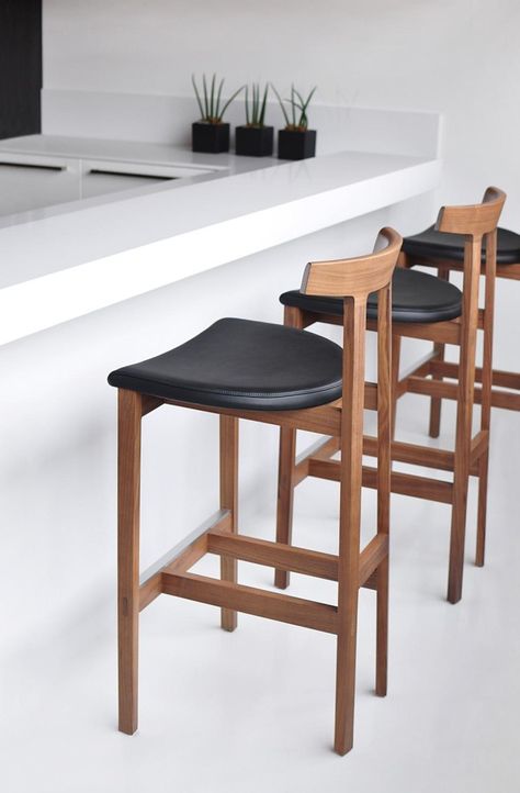 Bensen_Torii_Stool__Torii is available in Walnut, White Oak, and Black stained Ash, with leather or fabric upholstered seat. Counter Stool: 20.5″ W x 20.5″ D x 40.25″ H , starting at $790 Kursi Cafe, Kursi Bar, Kitchen Counter Stools, Wood Bar Stools, Stool Design, Wood Stool, Modern Bar Stools, Modern Bar, Wooden Stools