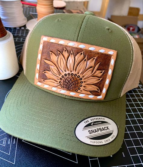 Sunflower tooled leather hat patch on Snapback trucker hat Leather Hat Patch, Western Bags Purses, Handmade Leather Work, Custom Leather Work, Country Hats, Cowgirl Accessories, Western Clothes, Leather Tooling Patterns, Hat Patch