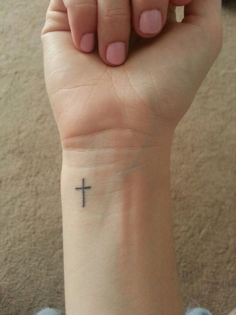 Small cross tattoo on wrist Christian Cross Tattoos, Tiny Cross Tattoo, Cross Tattoo On Wrist, Small Cross Tattoos, Small Cross Tattoo, Tattoo Son, Tattoo 2024, Tatoo Inspiration, Cross Tattoos For Women