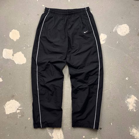 Nike Nike y2k Nylon Drill track Pants | Grailed Nike Pants Aesthetic, Nike Y2k Pants, Nike Parachute Pants Outfit, Nike Track Pants Outfits Men, Nike Trackpants Y2k, Nylon Pants Outfit Men, Nike Vintage Pants, Nike Baggy Pants, Baggy Nike Track Pants