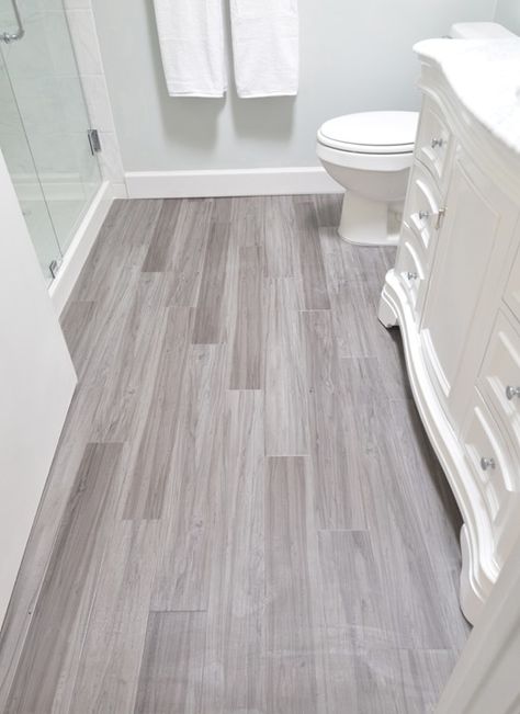 vinyl plank bathroom floor ... budget friendly  modern vinyl plank product. These are Trafficmaster Allure in Grey Maple installed in a random offset pattern like hardwood. Available at Home Depot, Basement Bathroom, Upstairs Bathrooms, Design Seeds, Bathroom Redo, Bath Room, Bathroom Renos, Vinyl Plank Flooring, Bath Remodel, Wood Flooring