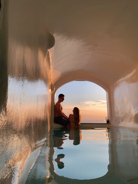 Couples travel | travel | couples picture | couples picture inspo | cave pool | cave pool in santorini | greece | greece travel | santorini travel | santorini cave pool | cave pool picture inspo | cave pool couples picture | couples pic inspo | cave pool at sunset | cave pool sunset | greece sunset | santorini sunset | athermi suites Greece Honeymoon Aesthetic, Greece Couple Pictures, Greece Aesthetics Honeymoon, Santorini Couple, Santorini Greece Aesthetic Couple, Couples In Santorini, Santorini Couple Photography, Cave Pool, Mountain Couple