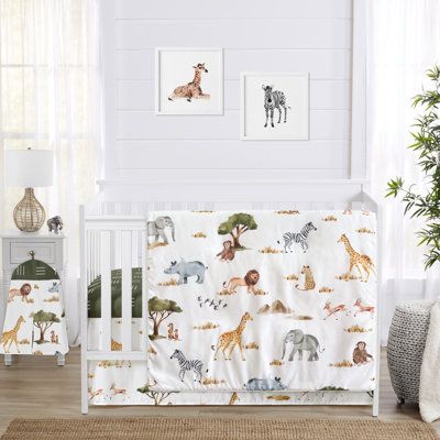 The 4pc Jungle baby bedding collection by Sweet Jojo Designs will create a delightful wilderness look for your nursery. This safari themed gender neutral crib bedding set uses a sensational collection of exclusive soft, brushed microfiber fabrics. It boasts hand painted watercolor jungle animals complete with lions, leopards, elephants, zebras, giraffes, rhinos, gazelles, chimps, and meerkats along with a mud cloth inspired hatch print. Illustrated in a modern color palette with shades of dark g Watercolor Jungle Animals, Neutral Crib Bedding Sets, Gender Neutral Crib Bedding, Hatch Print, Crib Bed Skirt, Mini Crib Bedding, Crib Liners, Neutral Crib, Crib Comforter