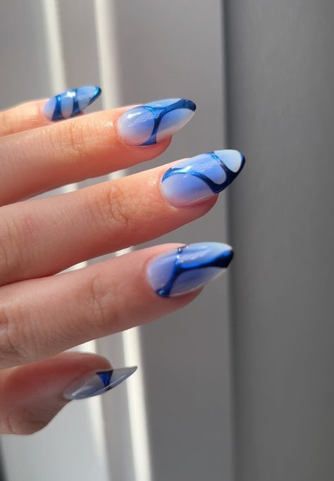 30 Edgy Almond Nails to Inspire You Minimalist Blue Nail Designs, Almond Nails Designs Funky, Navy Blue Almond Nail Designs, Blue And Black Almond Nails, Crazy Almond Nails, Blue Edgy Nails, Edgy Blue Nails, Simple Edgy Nails Almond, Nails For May 2024