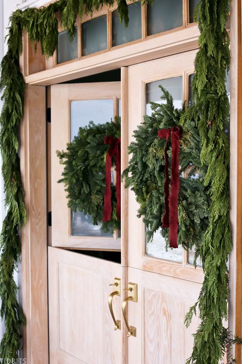 I spruced up our porch for the Christmas season using fresh garland, pine wreaths and other natural elements for a traditional, old fashioned Christmas porch. #camitidbits #christmasporch #christmasdecor #garland #christmaswreath Pine Wreaths, Porch Garland, Fresh Garland, Fresh Garlands, Front Porch Christmas Decor Ideas, Porch Christmas Decor Ideas, Porch Christmas Decor, Front Porch Christmas, Christmas Decor Ideas Diy