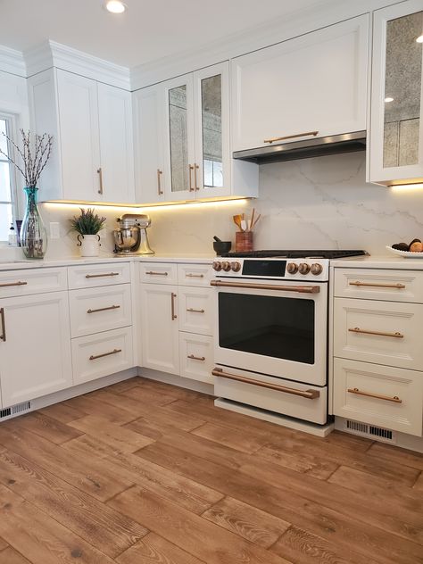 White And Bronze Kitchen, Ge Cafe Matte White, Range Hood White, Modern Range Hood, Mirrored Cabinet Doors, Kitchen Hood Design, Kitchen Renovation Inspiration, Kitchen Fan, Bronze Kitchen