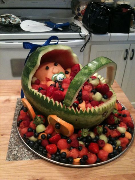 Get How To Make Watermelon Fruit Bowl For Baby Shower Shower Fruit Tray, Baby Shower Fruit Tray, Fruit Basket Watermelon, Watermelon Baby Carriage, Watermelon Fruit Bowls, Baby Shower Desserts Boy, Watermelon Basket, Baby Shower Foods, Baby Shower Watermelon