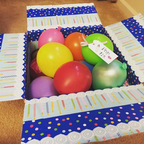 kids birthday care package with balloons filled with money and toys that say 'Pop Us' Kids Care Package, Packages Ideas, Birthday Care Package, Diy Care Package, Birthday Care Packages, Gifts Box, How To Wrap, Care Packages, Birthday Box