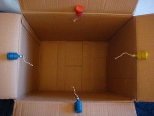 Picture of Glueing the Poppers to the Box Christmas Gift Pranks, Prank Box, Birthday Pranks, Christmas Pranks, Prank Gift Boxes, Exploding Gift Box, Funny Boyfriend Gifts, Prank Gifts, Creative Money Gifts