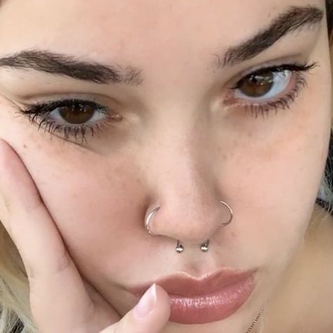 Both Sides Of Nose Pierced And Septum, Double Hoop Nose Ring Both Sides, Septum And Two Nose Piercings, Both Sides Of Nose Pierced Hoop And Stud, Double Stud Piercing Nose, Nose Ring Both Sides, Two Nostril Piercing And Septum, Two Nose Rings On Both Sides, Nose Piercing Both Sides And Septum