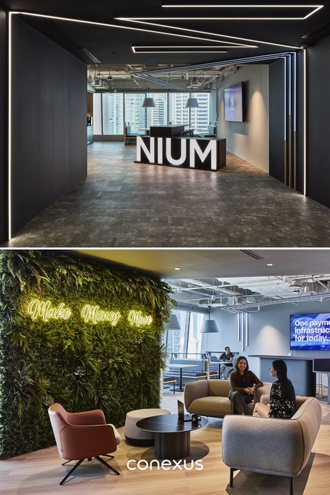 The departure from conventional office norms is further exemplified with a large Nium logo replacing a dedicated reception desk. The entrance is strategically dimmer with a lowered ceiling, crafting a sense of anticipation as visitors step into the office.  #modernreceptiondesign #luxuryofficedesign #fintechreception Open Office Design Workspaces Interiors, Office Reception Design Entrance, Office Entrance Design Entryway, Modern Office Reception Design, Reception Desk Design Entrance, Office Lobby Reception Waiting Area, Office Entrance Design, Headquarters Office Design, Office Reception Area Design