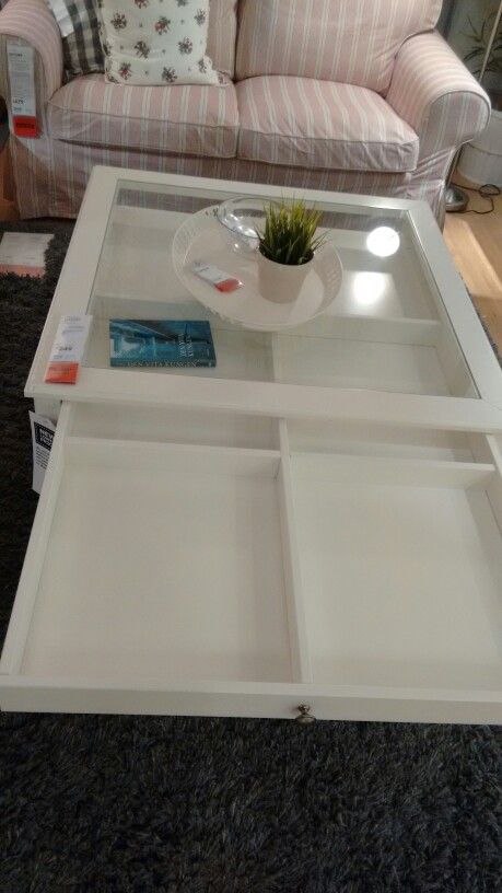 Liatorp coffee table with built-in display space.  At IKEA.  Probably going to cave in and buy this.  Or the plain-topped one at Pier One. Liatorp Coffee Table, Magnet Display, Coastal Chic Decor, Starting A Clothing Business, Hanover Street, 4 Season Room, Coffee Table Makeover, Puzzle Table, Babies Stuff