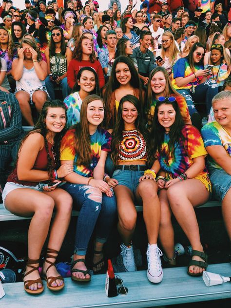 hippie themed football game Hippie Theme Football Game, Hippie Day Spirit Week, Football Game Themes, Football Game Outfits, Football Game Outfit Highschool, Abc Party Costumes, Homecoming Spirit Week, School Spirit Week, Hs Football