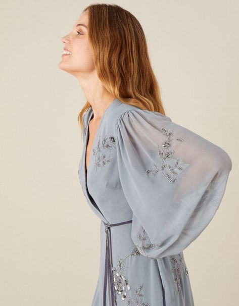 Gracie Embroidered Wrap Dress in Recycled Fabric Grey | Evening Dresses | Monsoon Global. Grey Evening Dresses, Evening Dress Collection, Sheer Overlay, Women's Evening Dresses, Shoulder Chain, Capsule Collection, Sustainable Fabrics, Recycled Fabric, Occasion Dresses